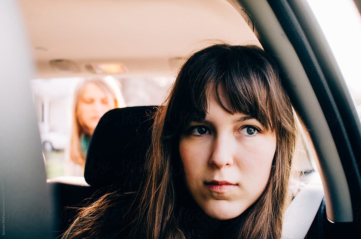 "Teen Girl Waits In Car While Sister Removes Items From Trunk" by